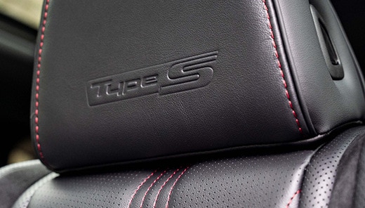 2026 Acura MDX Type S embossed headrest with red contrast stitching (Premium Performance SUV).