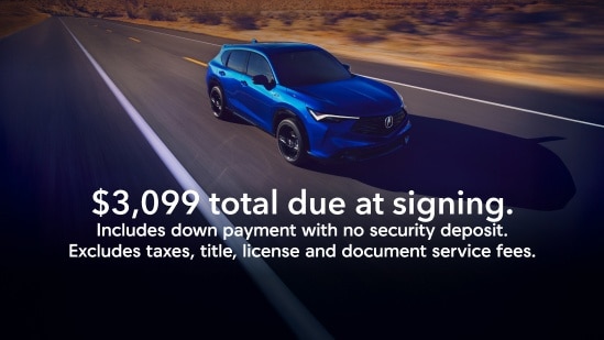 Acura 2025 ADX in Adriatic Sea Blue Meatallic driving on a desert highway