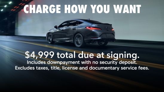 2025 Acura Integra A-Spec rear driver view driving on a tunnel