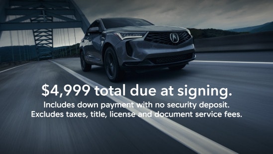 Acura 2026 RDX SH-AWD in Liquid Carbon Metallic with on screen offer text starting $4,999 total due at signing. Includes down payment with no security deposit. Excludes taxes, title, license and document service fees.