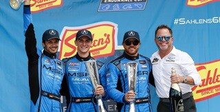 Acura Meyer Shank Racing #86 team take the podium Acura Meyer Shank Racing #86 team take the podium